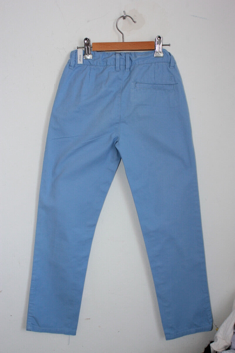 tweedehands katoenen lichtblauwe lange broek in maat 128 voor een jongen van jacadi