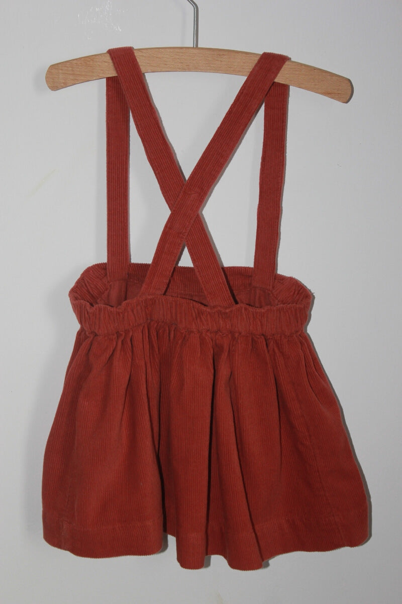 tweedehands katoenen roestbruine corduroy rok met schouderbanden in maat 80 van vert baudet