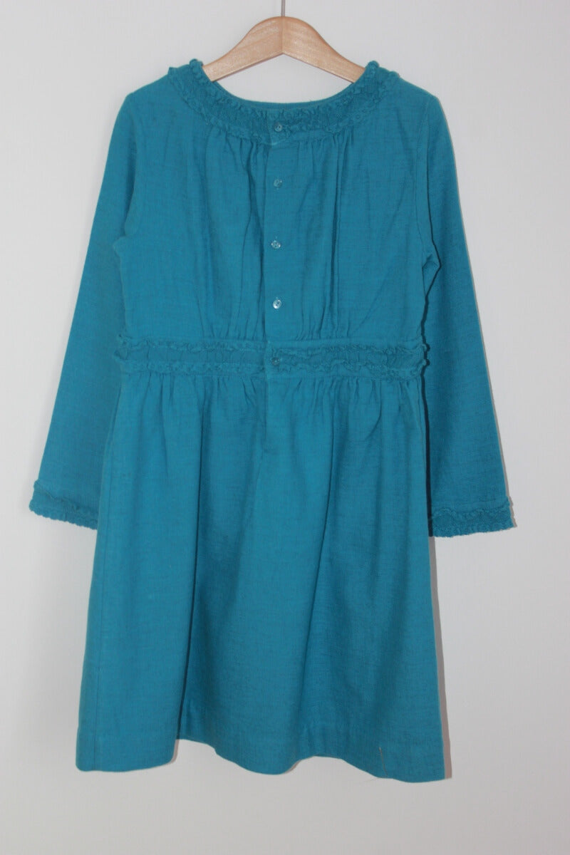 Blauwe jurk met lange mouwen van bonpoint in maat 128 voor een meisje