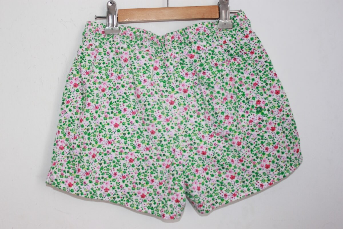 tweedehands unisex katoenen gebloemde zwemshort in multicolour van b con b in maat 7-8 jaar