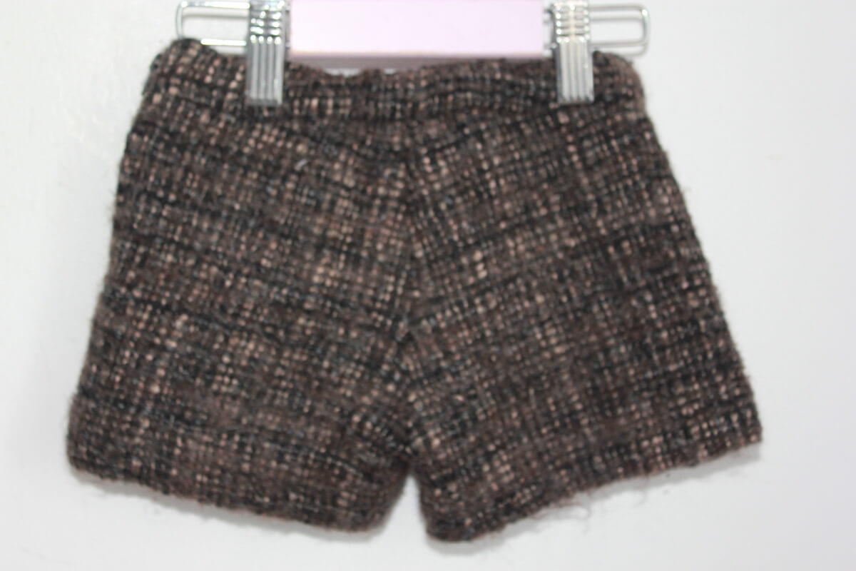 tweedehands grijs gemeleerde winterse korte broek in maat 92 van lili gaufrette voor een meisje