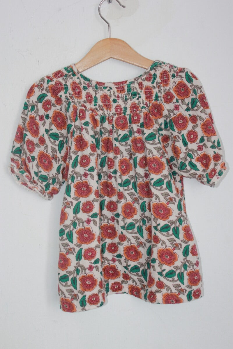 tweedehands katoenen gebloemde blouse met korte mouwen in maat 128 voor een meisje van monoprix