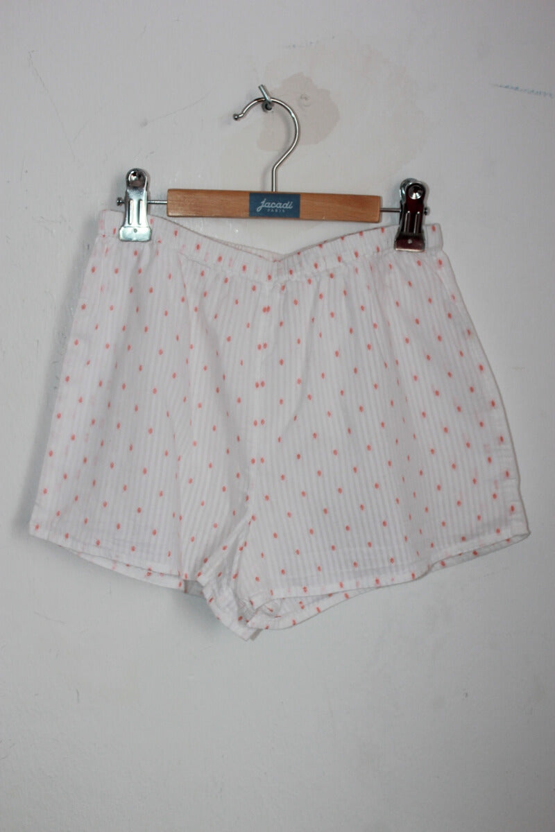 tweedehands witte zomerse pyjama met koraalroze stipjes en korte mouwen voor een meisje in maat 134-140 van Monoprix