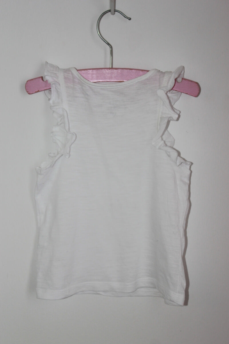 preloved wit mouwloos shirtje met volants in maat 92 voor een meisje van tex