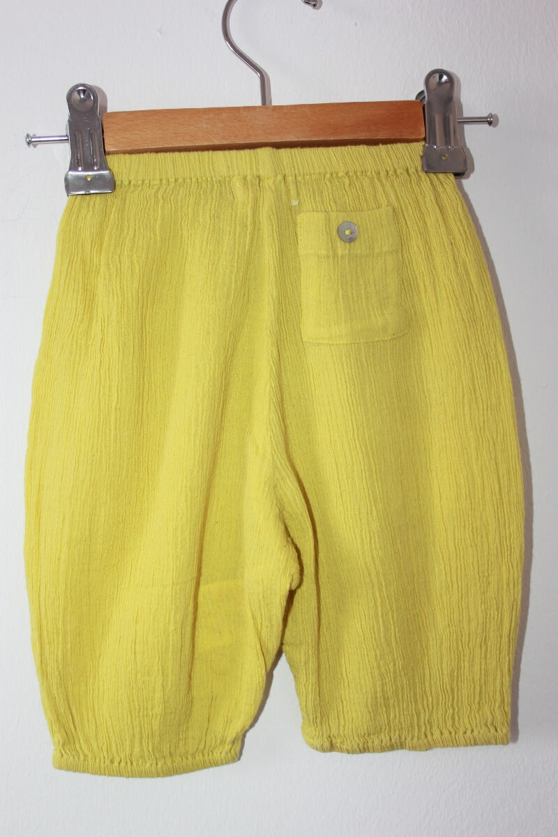 preloved unisex katoenen zomerse gele lange broek van wowo paris in maat 62