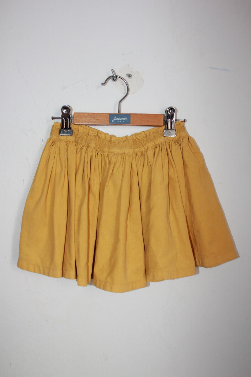 tweedehands ribfluwelen mosterdgele rok van bonton in maat 110-116