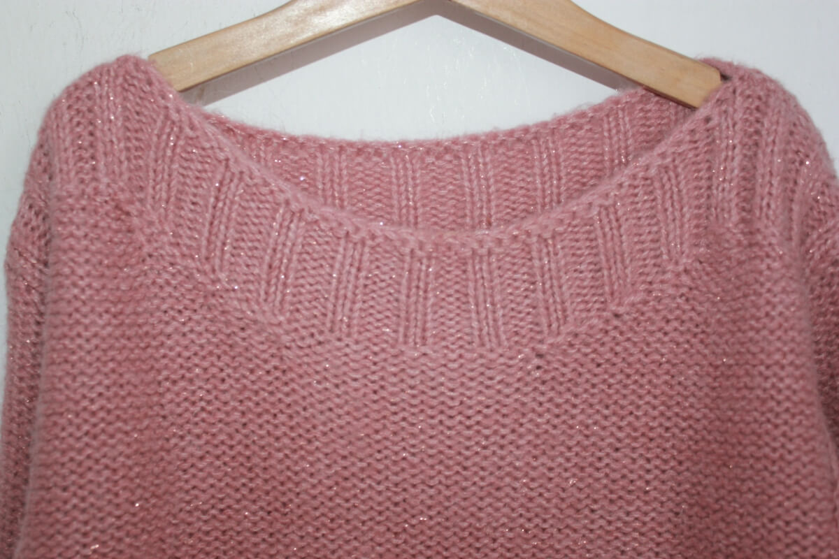tweedehands koraalroze warme trui met een glittertje van bonton in maat 128 voor een meisje