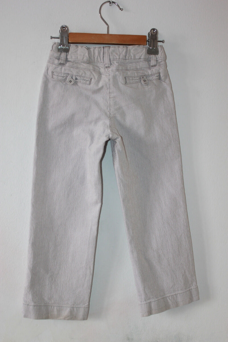 tweedehands unisex katoenen grijs met wit gestreepte lange broek in maat 104 van jacadi