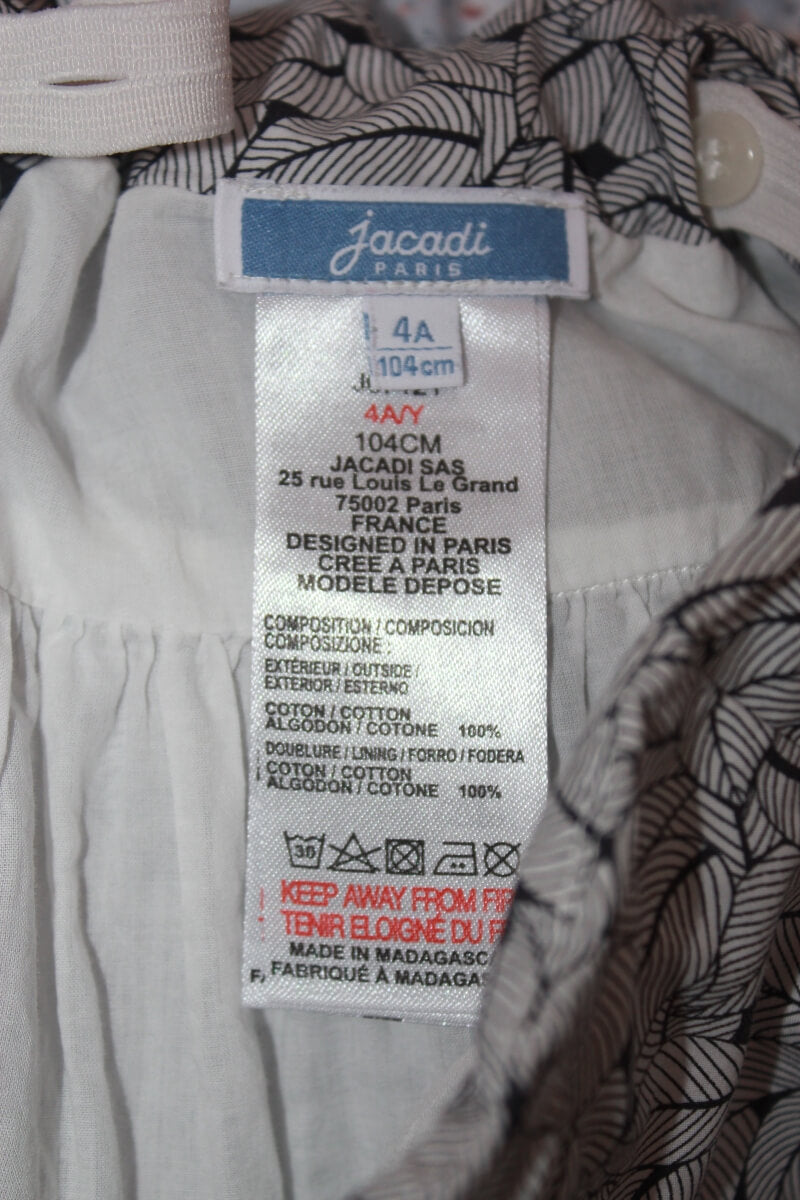 tweedehands zwart met witte katoenen rok met blaadjes van jacadi in maat 104 voor een meisje