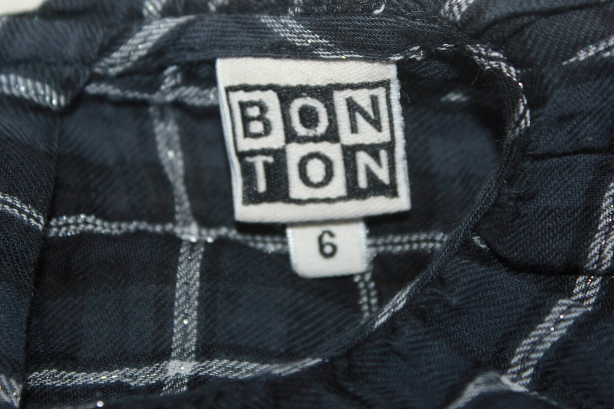 tweedehands zwart met grijze geruite jurk met lange mouwen in maat 116 van bonton