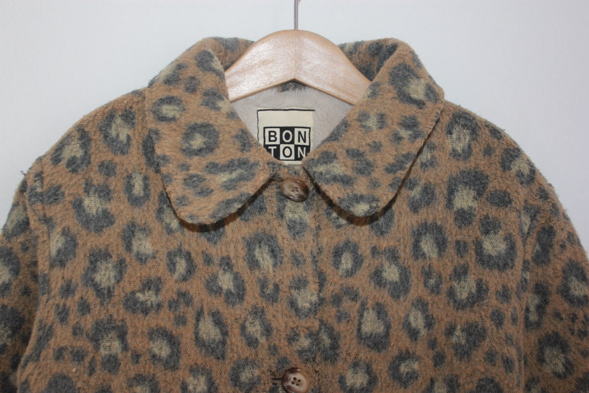 tweedehands winterjas met luipaard print in maat 128  voor een meisje van bonton