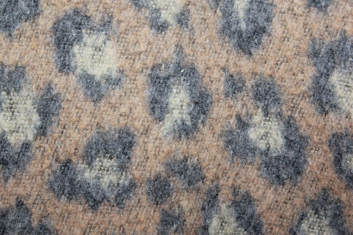 tweedehands winterjas met luipaard print in maat 128  voor een meisje van bonton