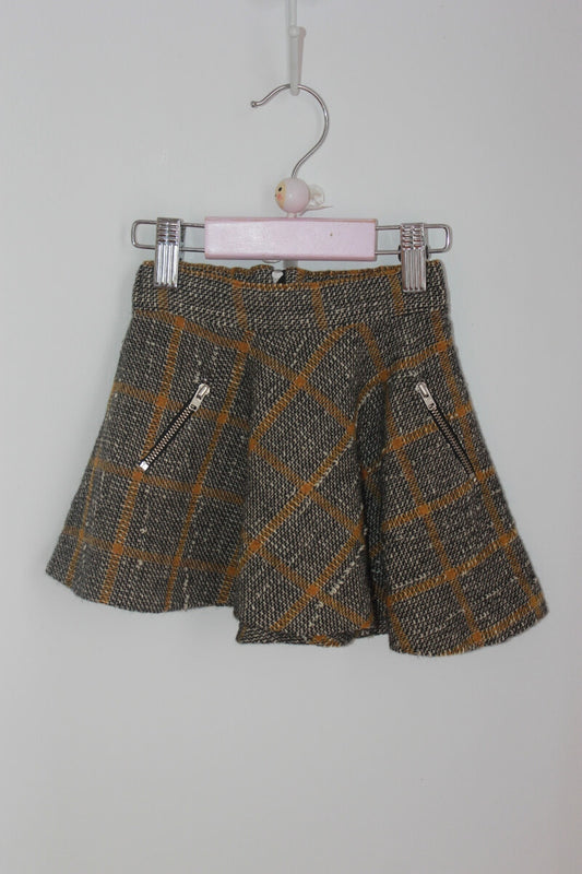 tweedehands winterse grijs met mosterdgeel geruite asymmetrische rok van bonpoint in maat 92