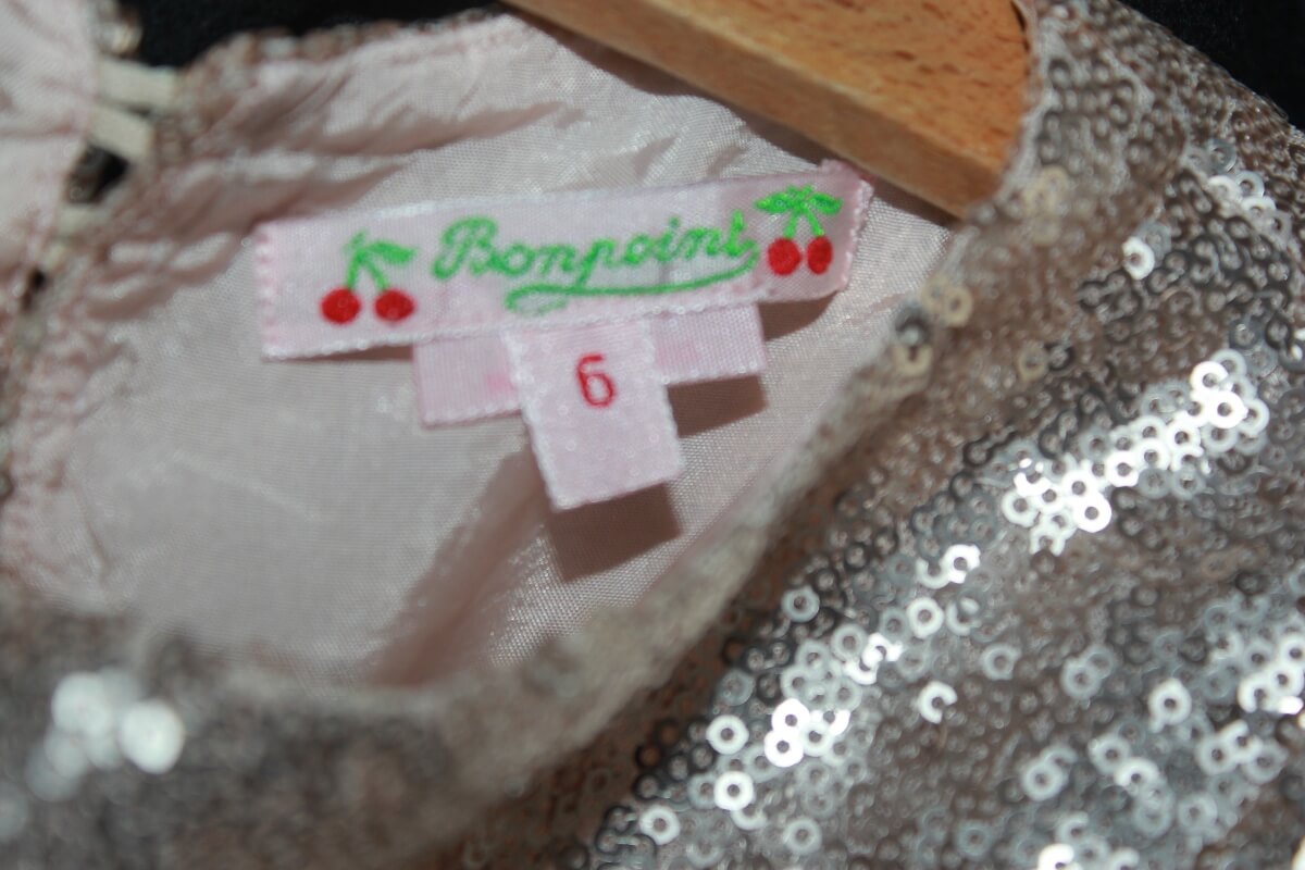 tweedehands top met gouden pailletten en lange mouwen van bonpoint in maat 110-116 voor een meisje