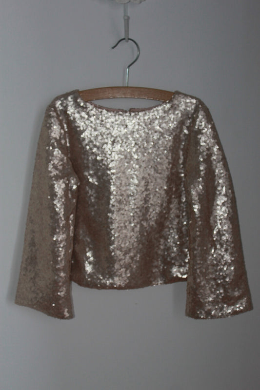 tweedehands top met gouden pailletten en lange mouwen van bonpoint in maat 110-116 voor een meisje