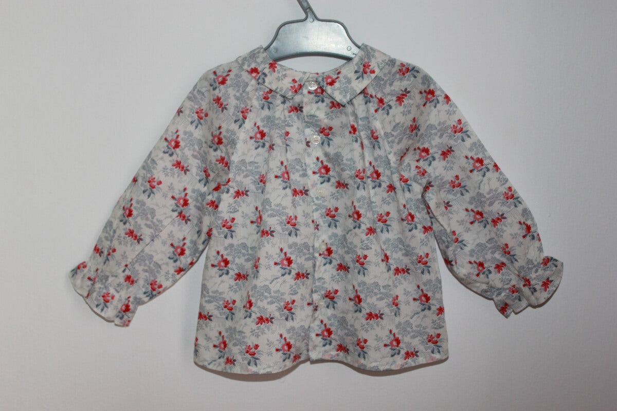 preloved katoenen rood, wit en blauwe gesmokte liberty blouse met lange mouwen van bonpoint, maat 68-74 voor een baby meisje