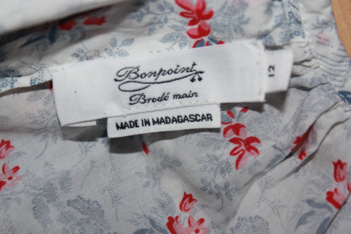 preloved katoenen gesmockte liberty blouse in blauw, rood en wit, met lange mouwen, van bonpoint in maat 152 voor een meisje