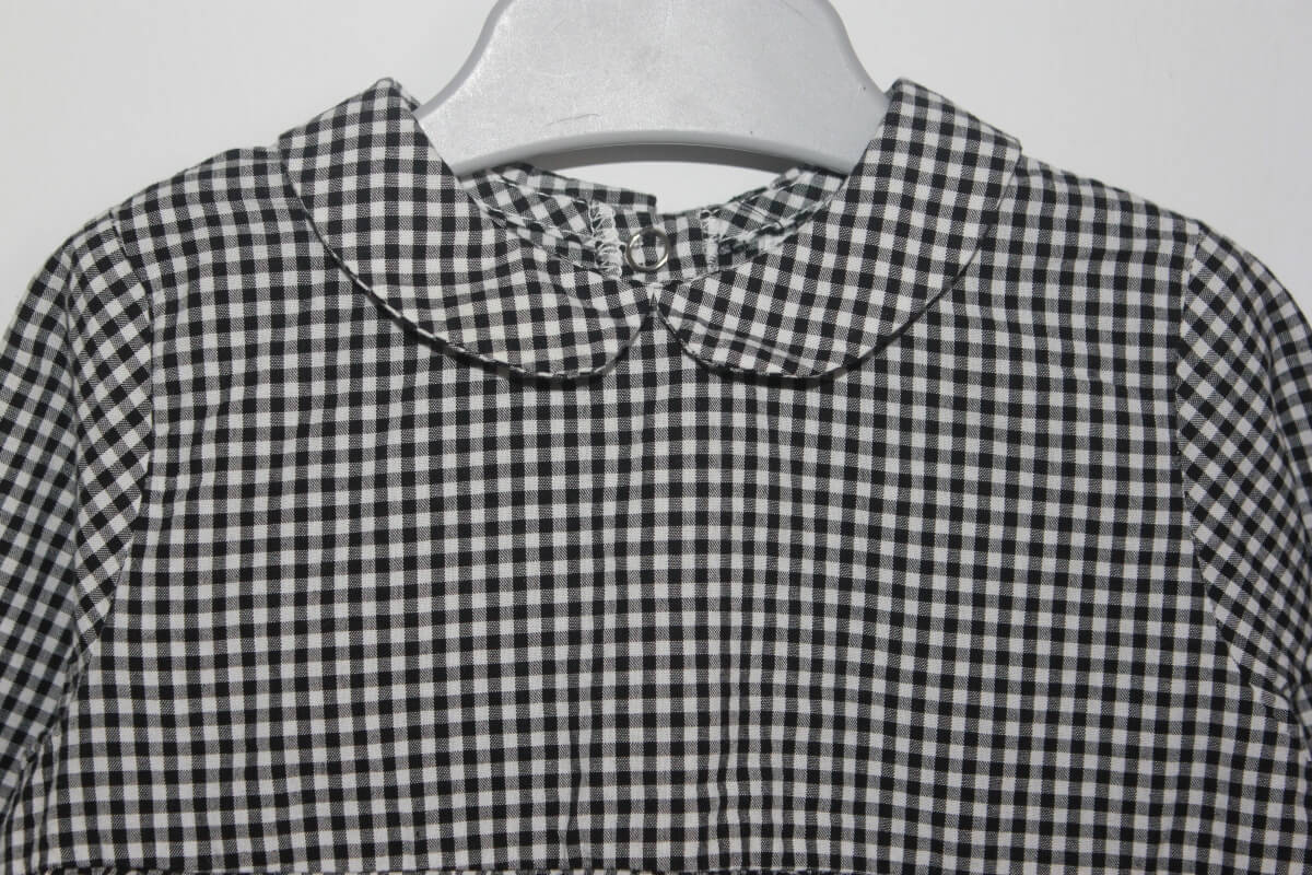 tweedehands zwart-wit geruite korte jurk met lange mouwen van eden et victor in maat 68