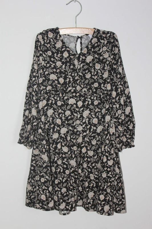 preloved zwarte jurk met witte bloemen, gele details en lange mouwen van zara in maat 116 voor een meisje