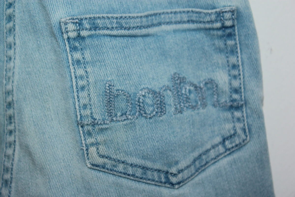 tweedehands denim salopette of tuinbroek in maat 110 voor een meisje van bonton