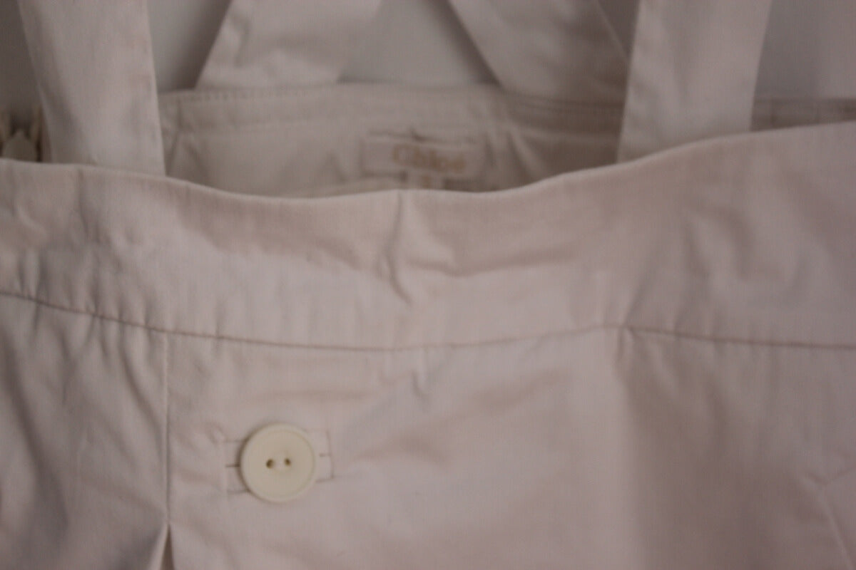 tweedehands creme rokje met schouderbanden in maat 92 van chloe