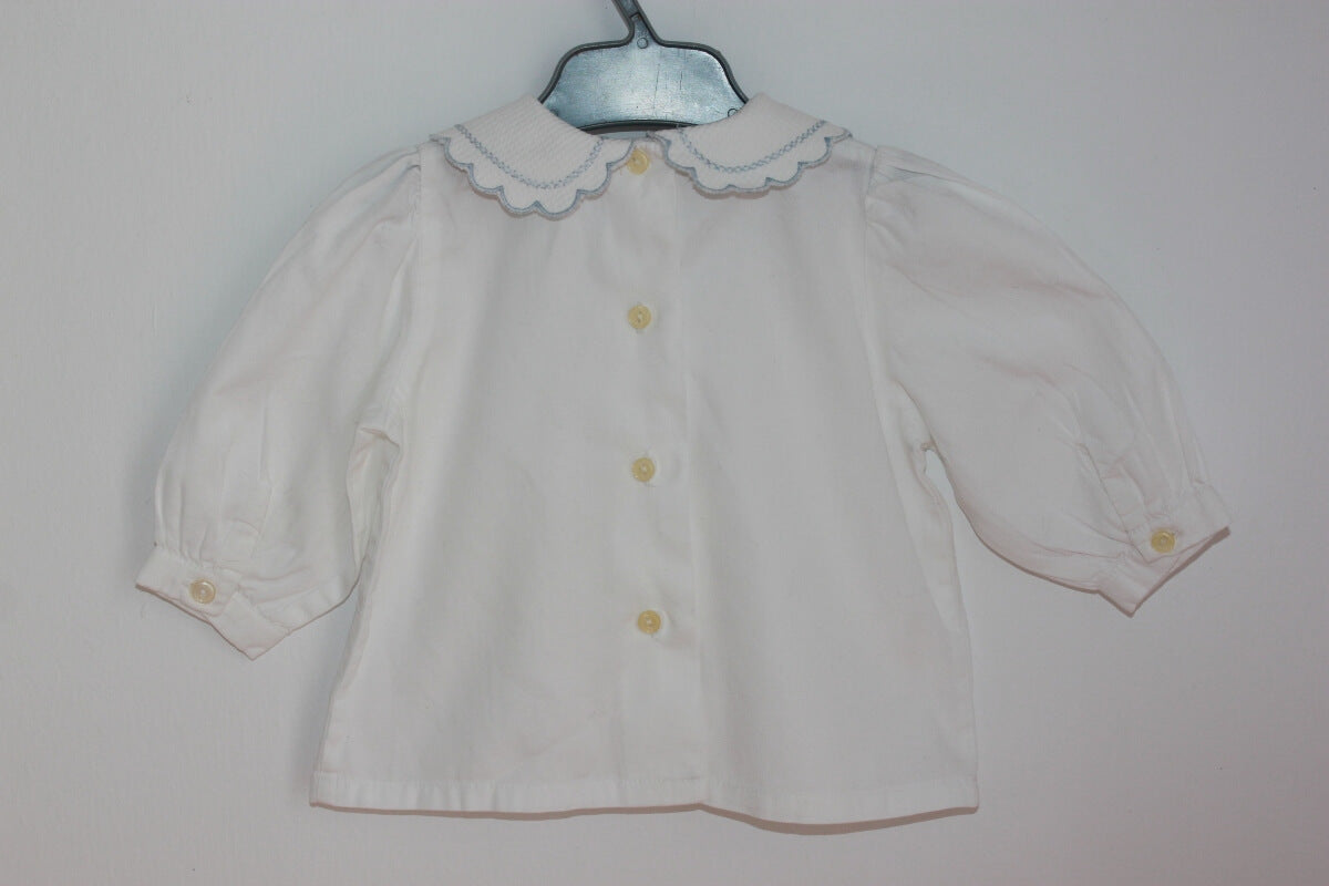 preloved katoenen witte blouse met lange mouwen van cyrillus in maat 68 voor een baby meisje 