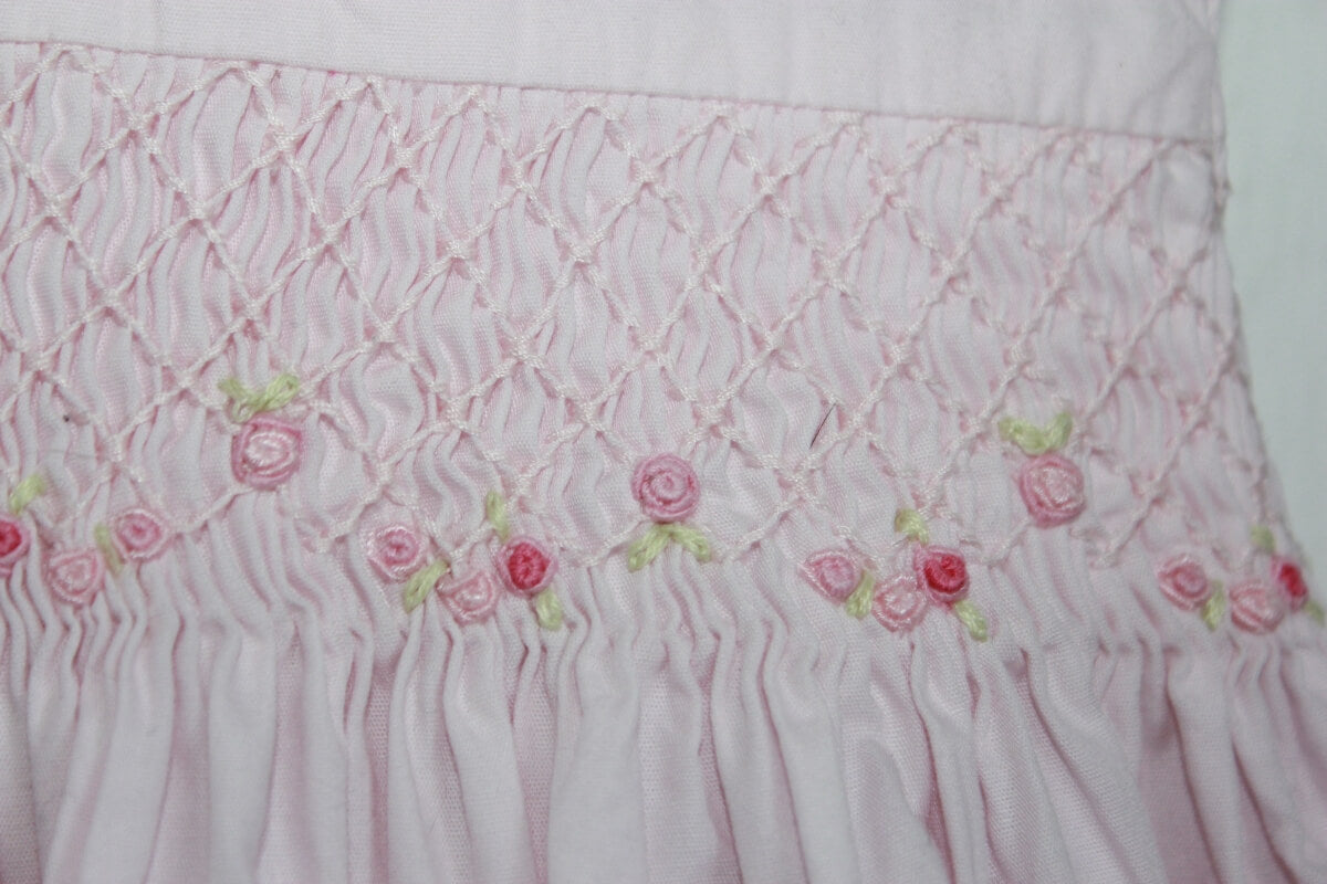 tweedehands katoenen zomerse mouwloze gesmockte roze jurk in maat 74 van cyrillus