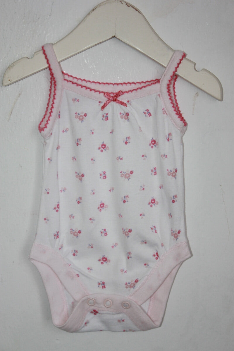 tweedehands katoenen gebloemd rompertje in multicolour met schouderbandjes maat 56 van early days