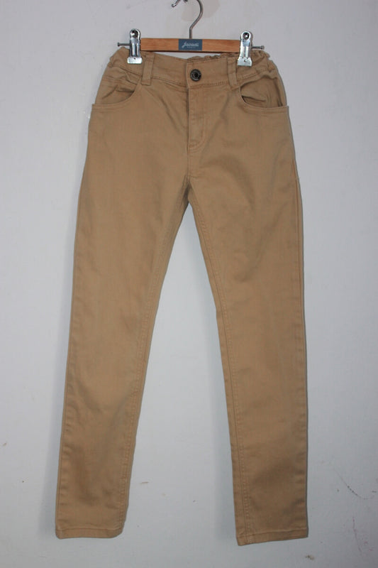 tweedehands unisex mosterdgele lange broek in maat 140 van cyrillus