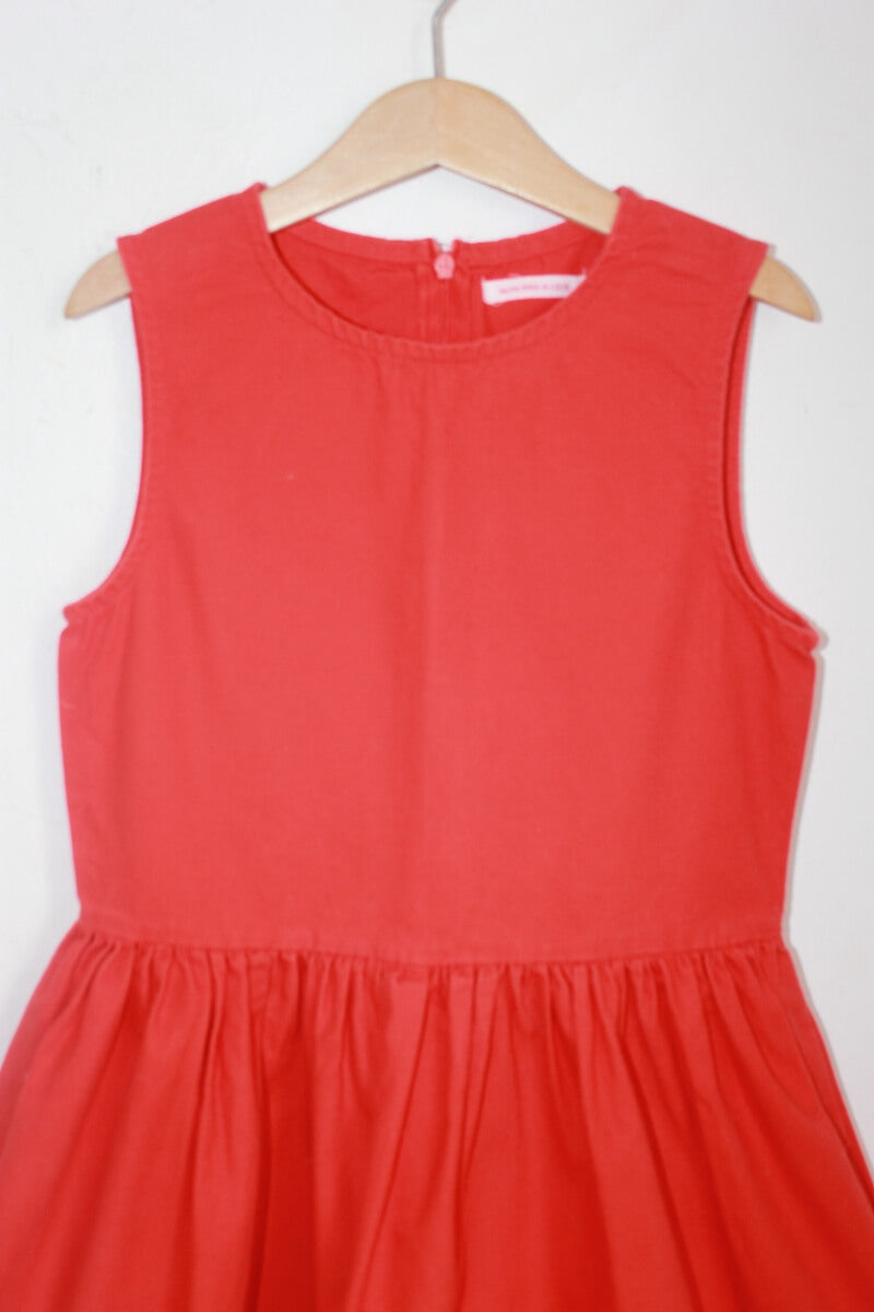 tweedehands katoenen rode mouwloze jurk in maat 134 van monoprix
