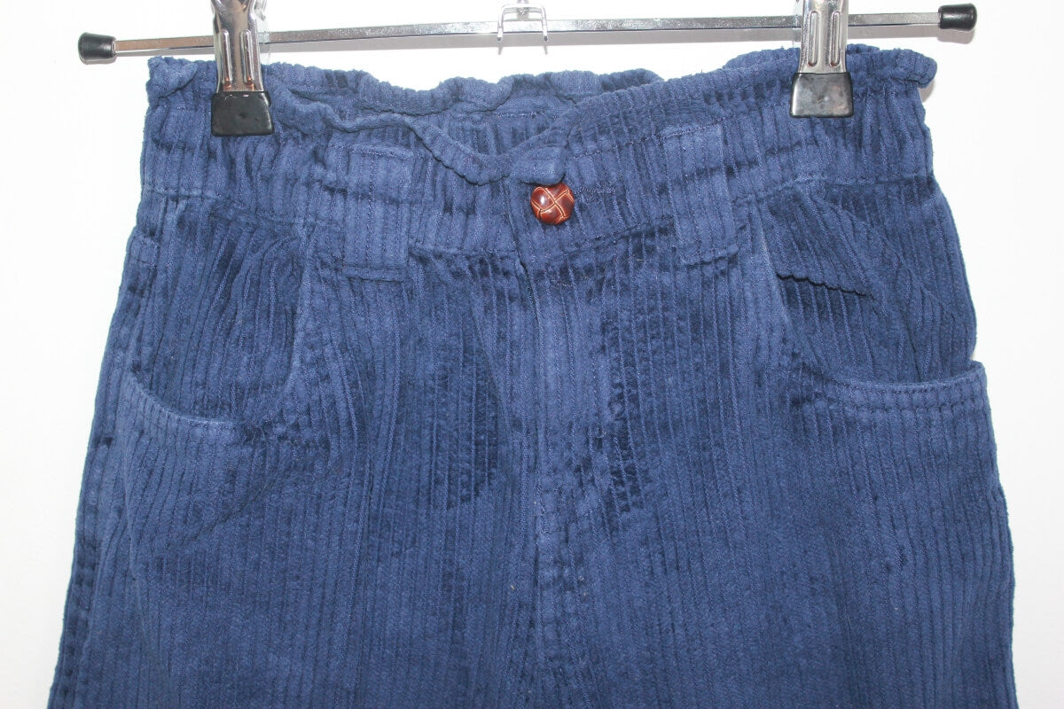 tweedehands blauwe lange ribfluwelen broek in maat 122-128 van monoprix voor een meisje