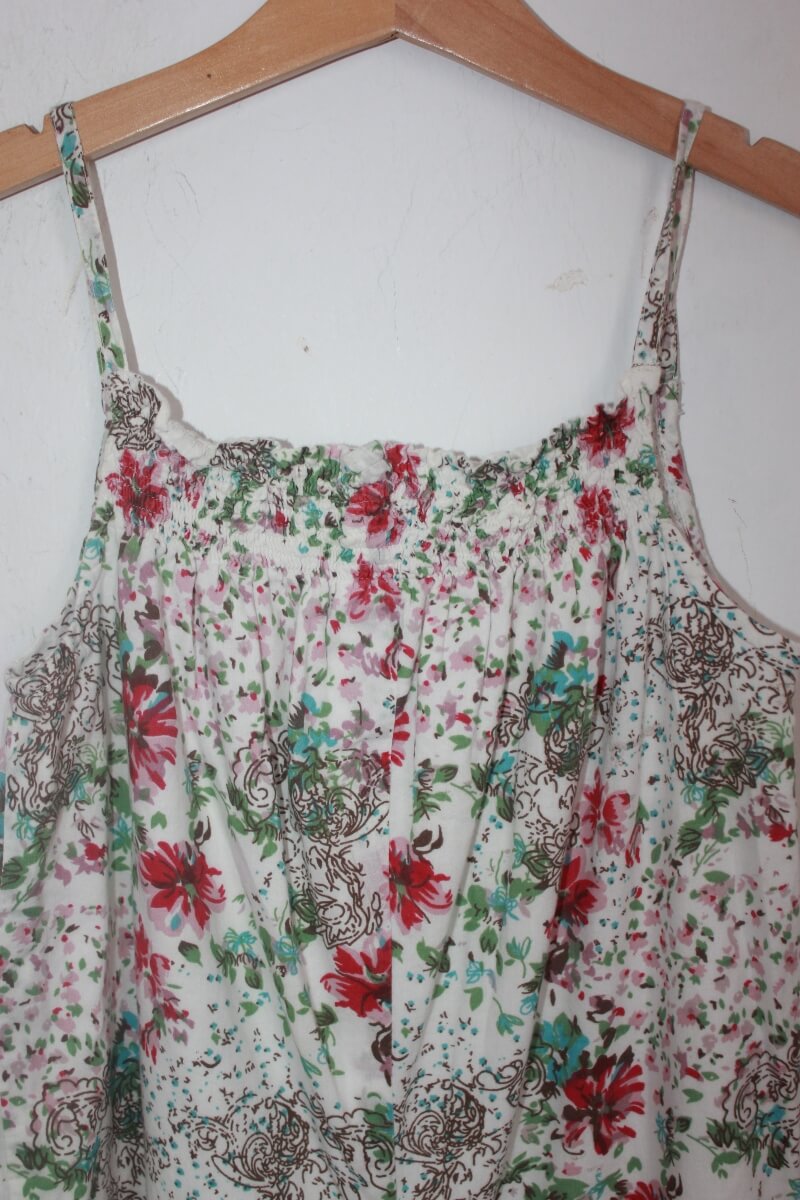 tweedehands gebloemde zomerse jumpsuit in multicolour, maat 104 voor een meisje van neck & neck