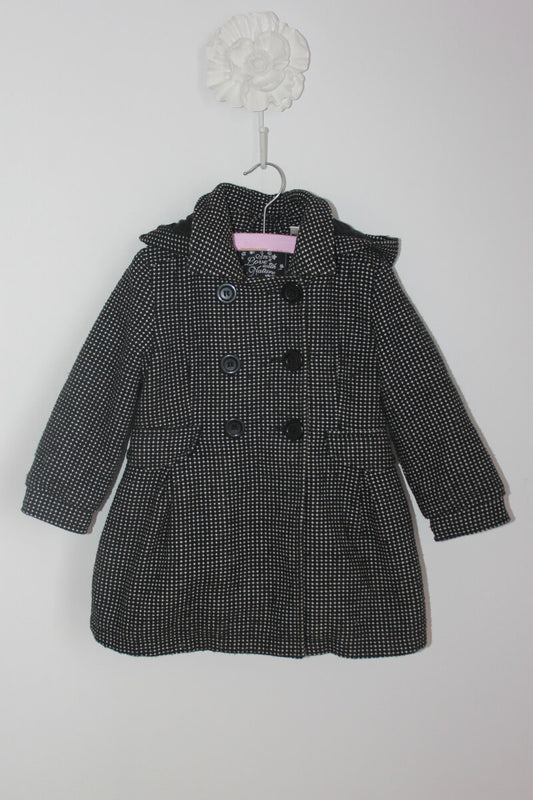 tweedehands zwarte jas met ecru stipjes en capuchon in maat 98 voor een meisje van palomino