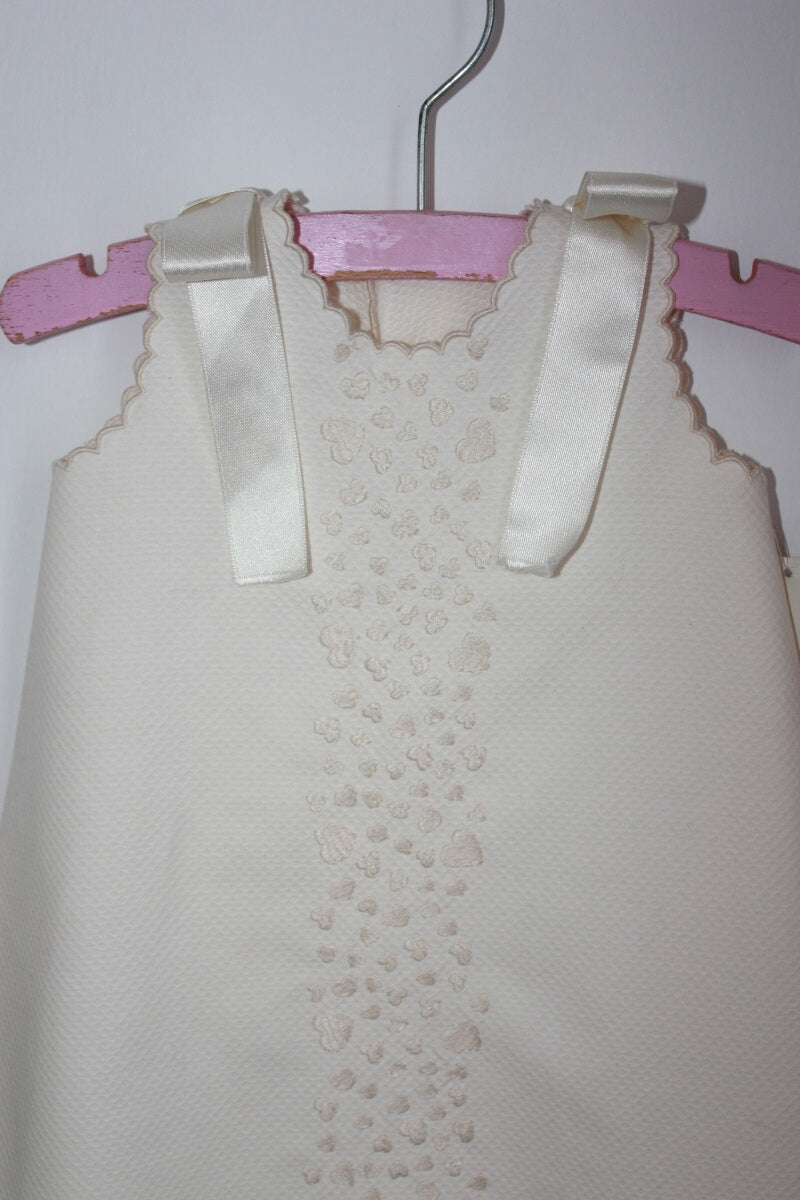 tweedehands creme mouwloze jurk van piccolos in maat 62