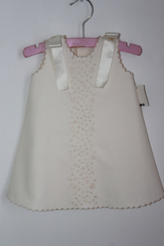 tweedehands creme mouwloze jurk van piccolos in maat 62