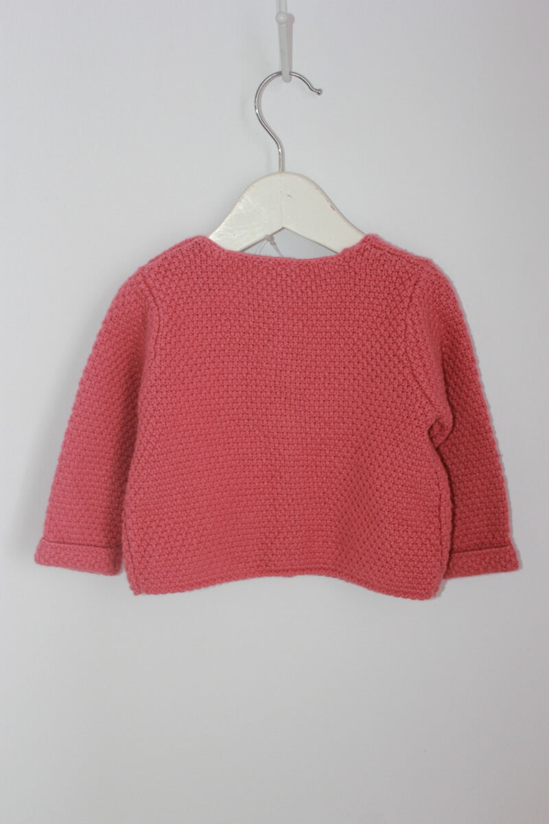 tweedehands koraalroze vestje in maat 68 voor een baby meisje van tex