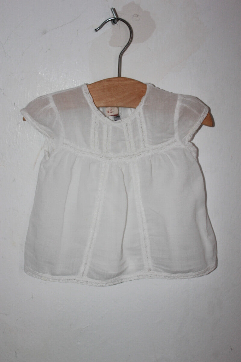 tweedehands zomerse witte blouse met korte mouwen van tizzas in maat 56 voor een baby meisje