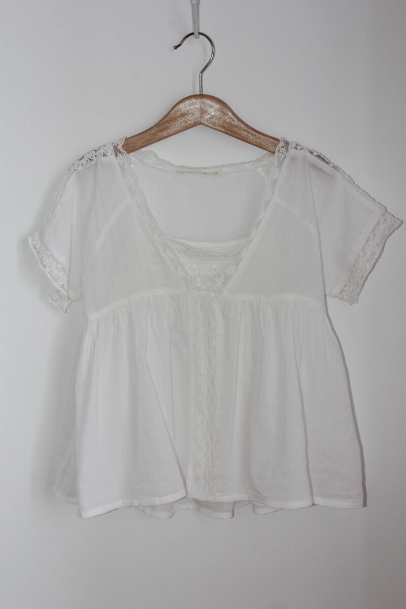 tweedehands ecru blouse met korte mouwen van zara in maat 128