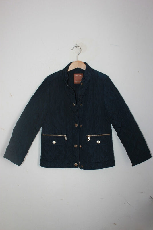 Tweedehands donkerblauwe jas voor het tussenseizoen in maat 128 voor een meisje van zara
