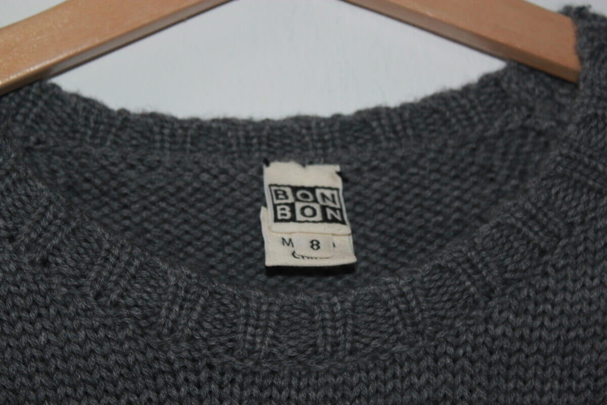 tweedehands unisex wollen warme grijze trui (met geel, ecru en zwart) van bonton maat 122-128