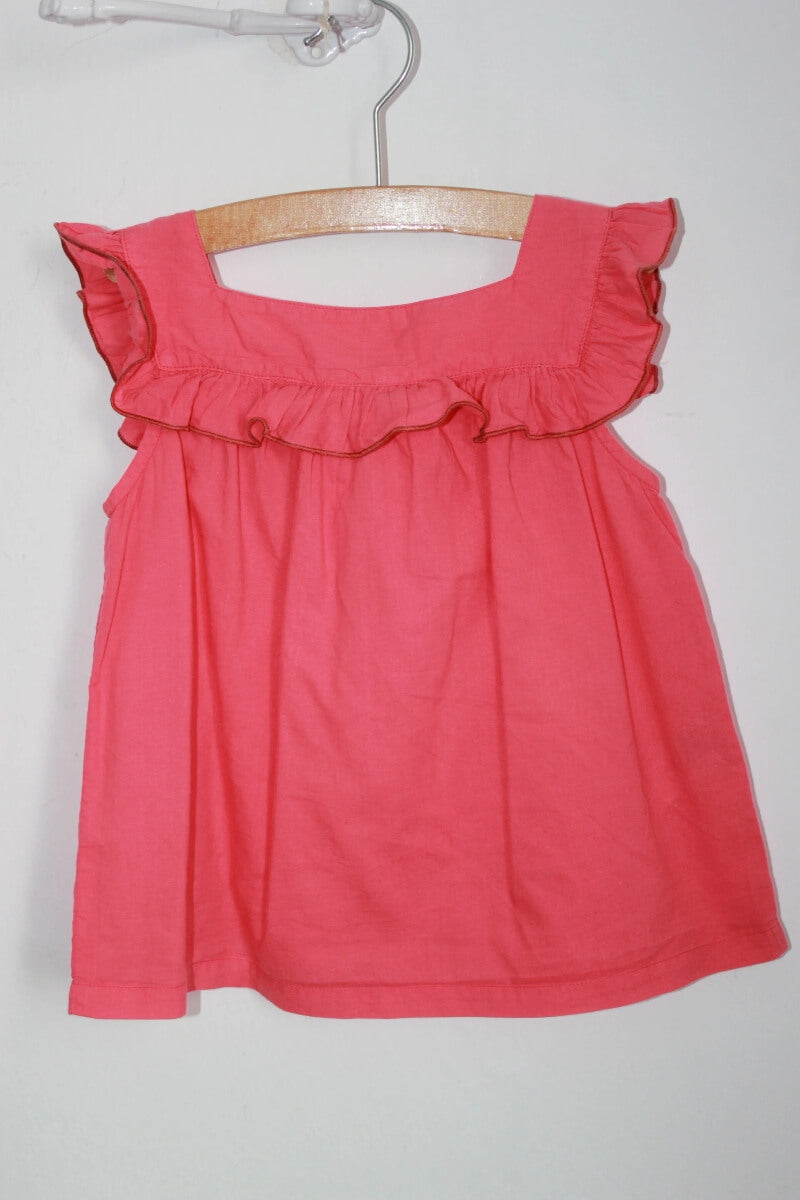 tweedehands katoenen zomerse mouwloze koraalroze bloese met volants van bonton in maat 98-104 voor een meisje