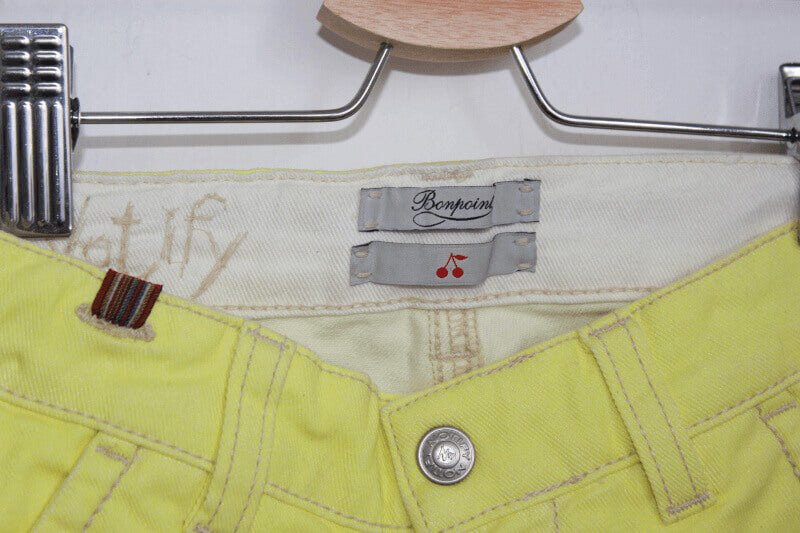 preloved gele lange broek van bonpoint x notify maat 110-116 voor een meisje