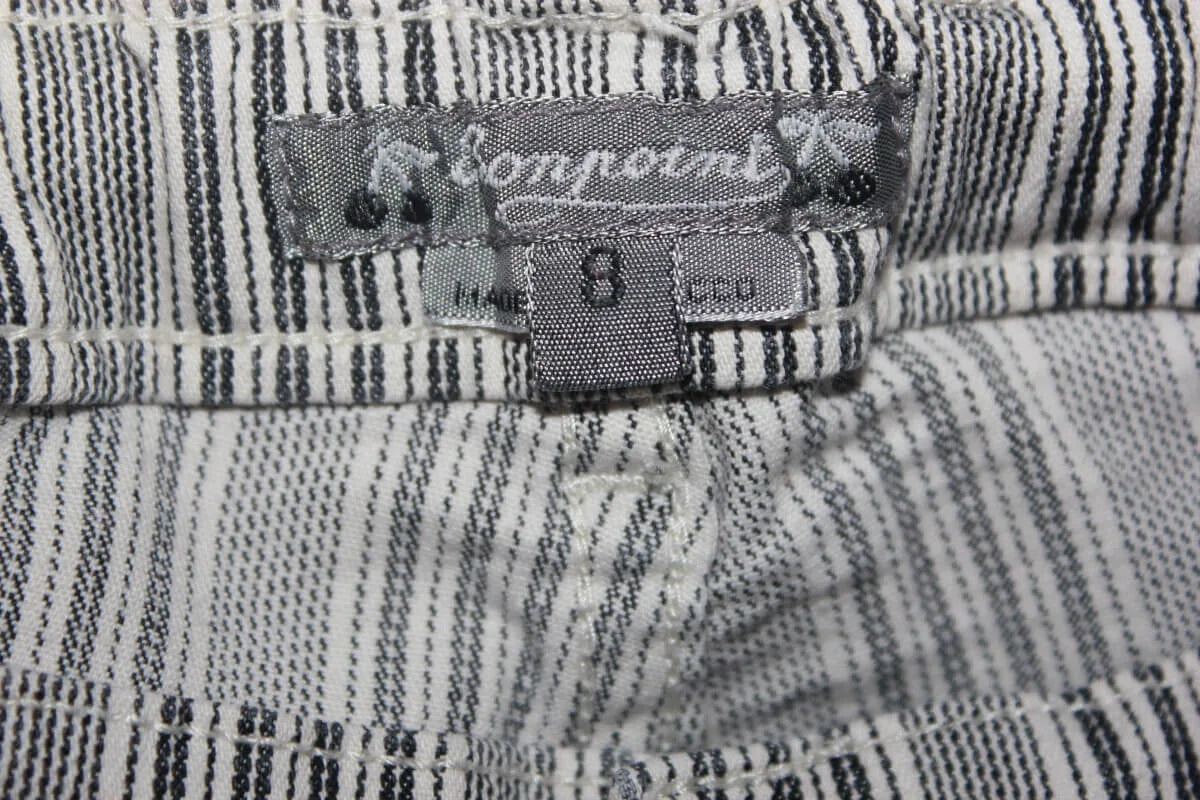 tweedehands unisex donkerblauw met wit gestreepte lange broek van bonpoint in maat 122-128