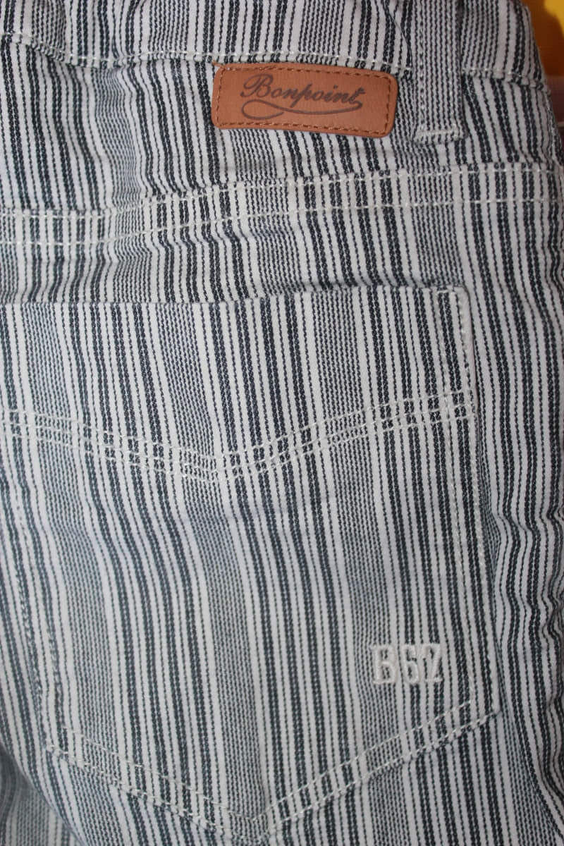 tweedehands unisex donkerblauw met wit gestreepte lange broek van bonpoint in maat 122-128