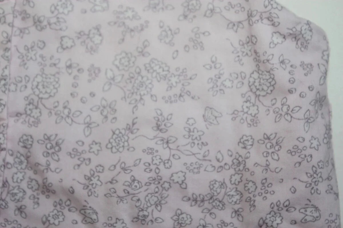 tweedehands katoenen winterse mouwloze roze en lila gebloemde jacadi jumpsuit in maat 62 voor een baby meisje