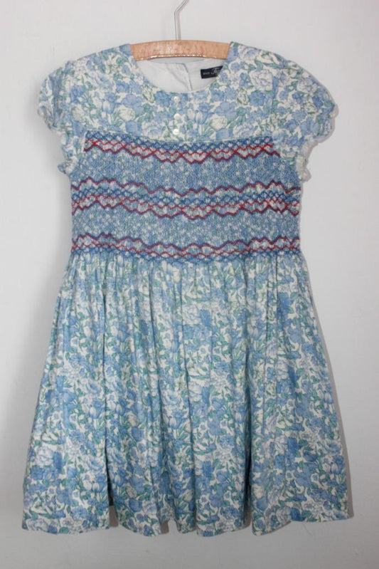 tweedehands-gesmockte-jurk-blauwe-bloemen-korte-mouwen-tizzas-maat-122