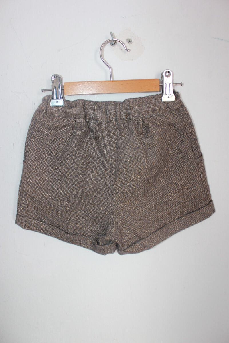 tweedehands-grijze-korte-broek-gouden-glittertje-hennes-en-mauritz-maat-110-meisje